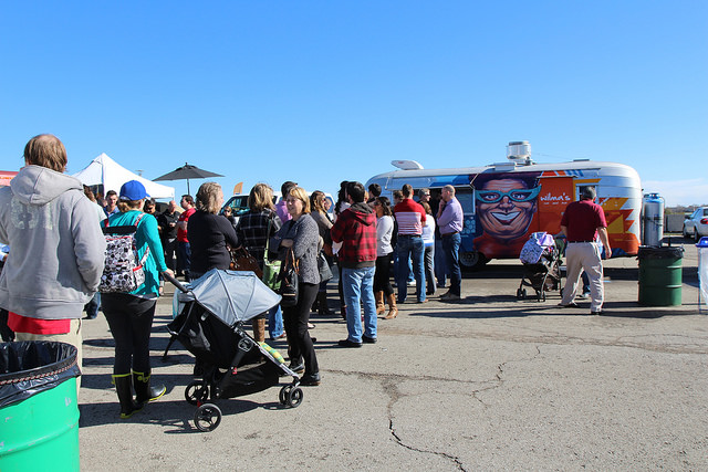 people in queue at a burger and beer joint in bayfront park